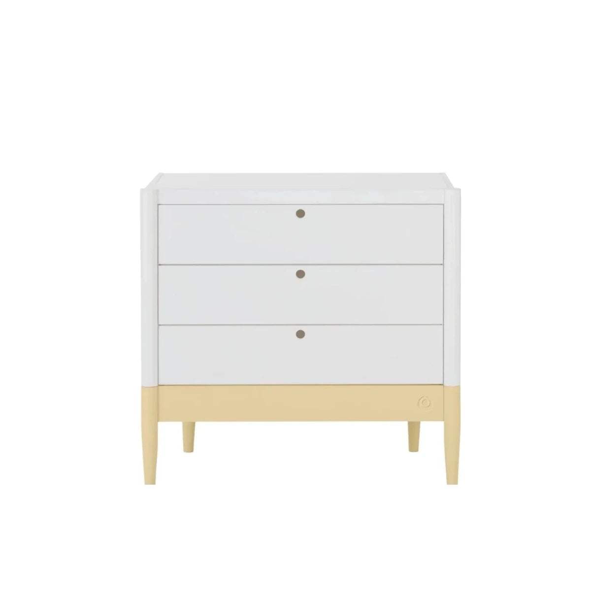 Three-drawer baby dresser in white with primrose yellow base trim and brass-tone drawer pulls
