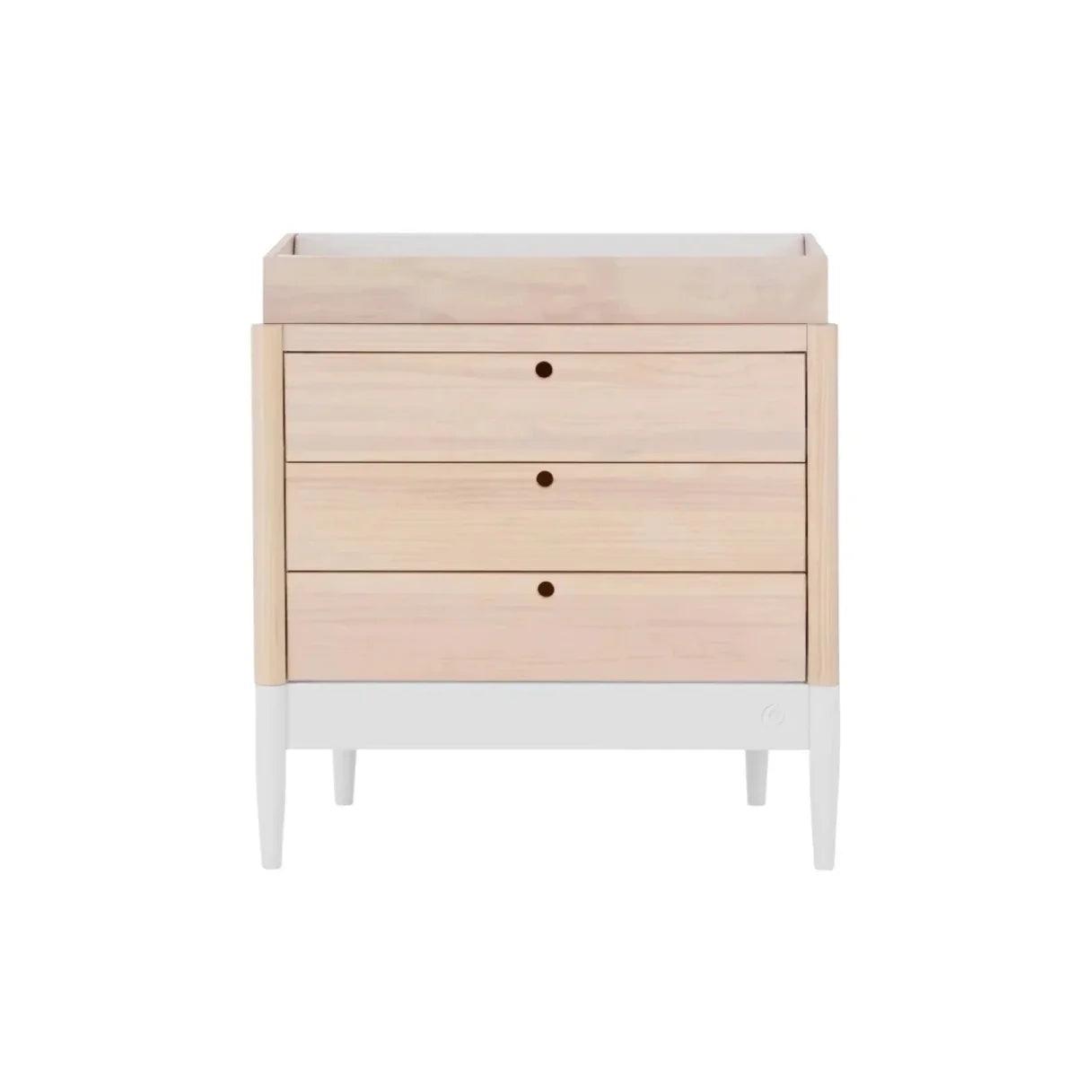 White and natural baby dresser, front view, three drawers with round knobs