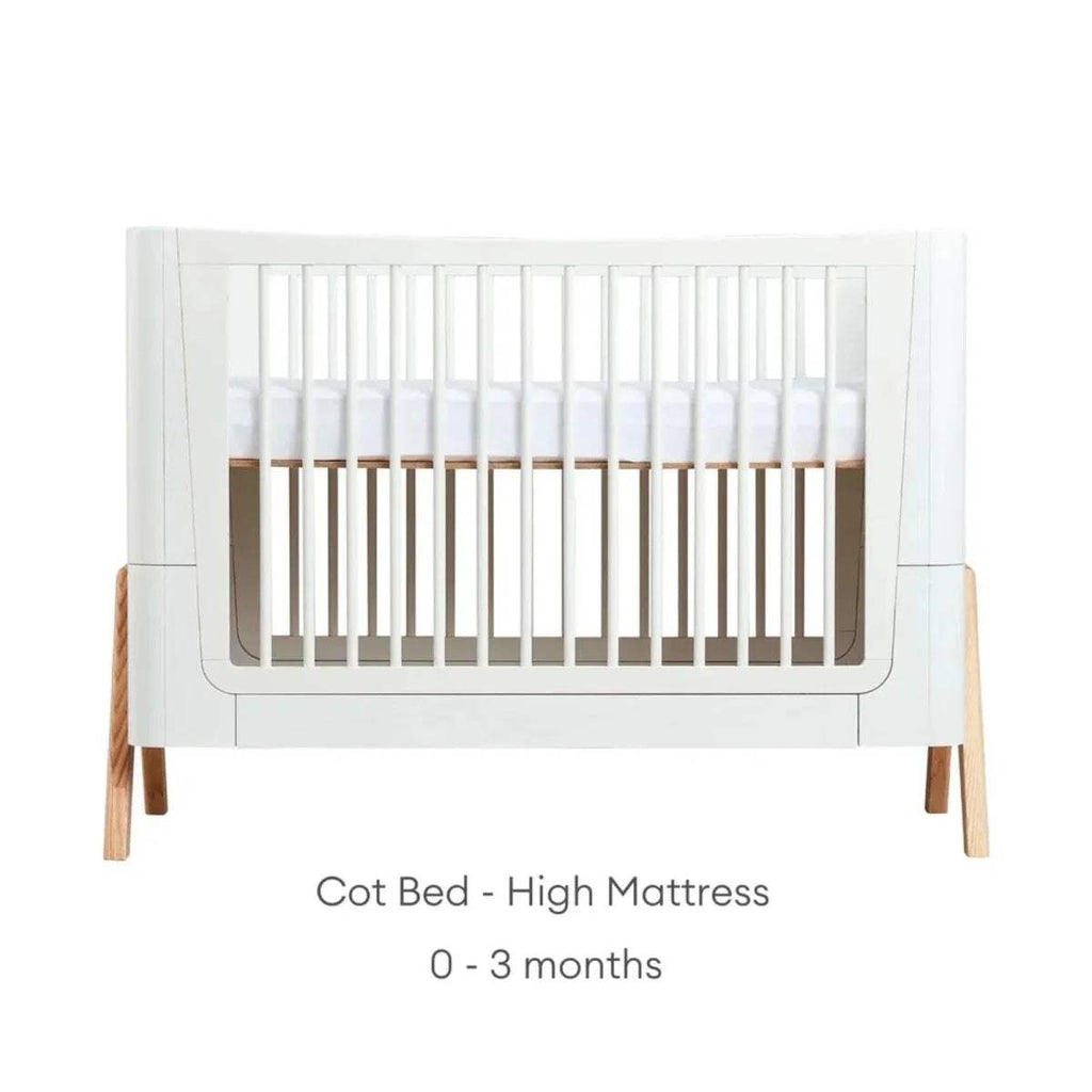 Cot bed high-mattress setup diagram for 0–3 months