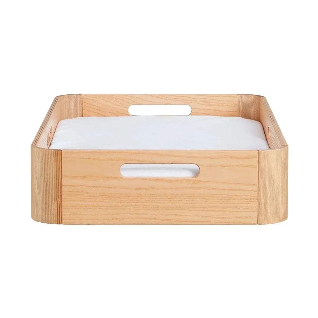 Natural wood changing tray with center handle and padded insert