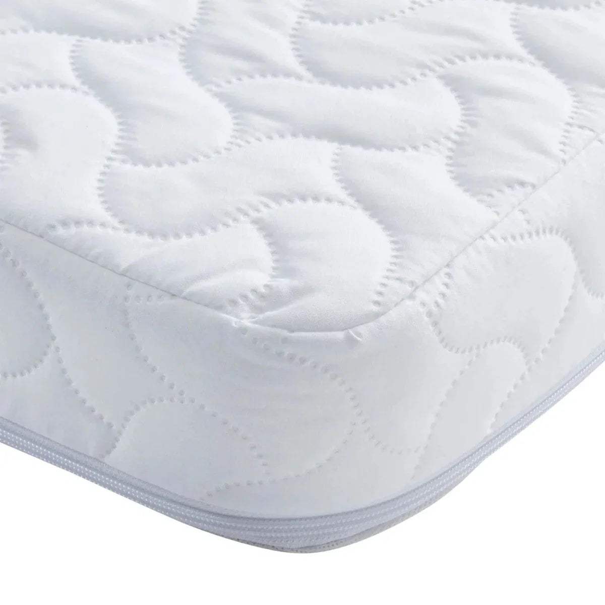White quilted mattress top with stitched circular padding pattern and padded border.