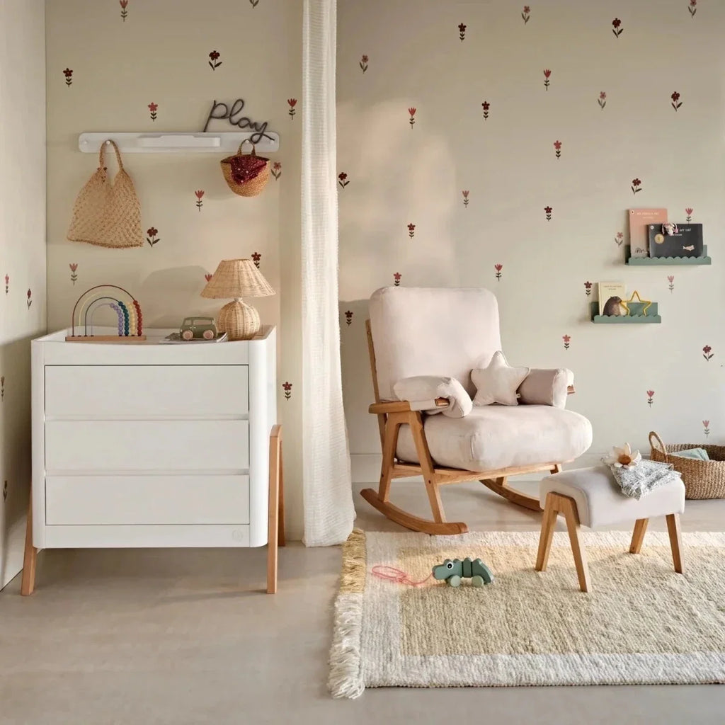 Gaia Baby Hera rocking chair with light oak frame and off-white cushioning, including footstool