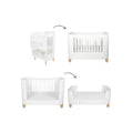 White cot bed with high rail, curved sides and vertical slat ends, natural wood feet