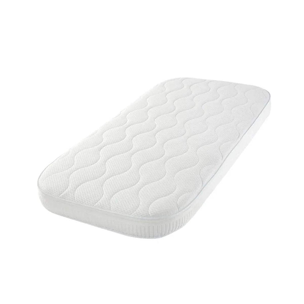 White baby cot bed mattress with quilted wavy top surface