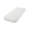 White baby cot bed mattress with quilted wavy top surface