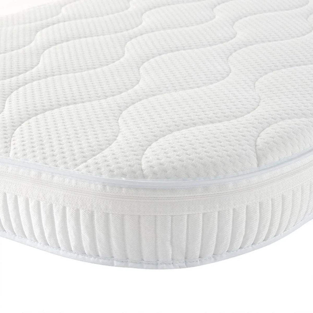 White cot bed mattress with quilted top and elasticized side skirt