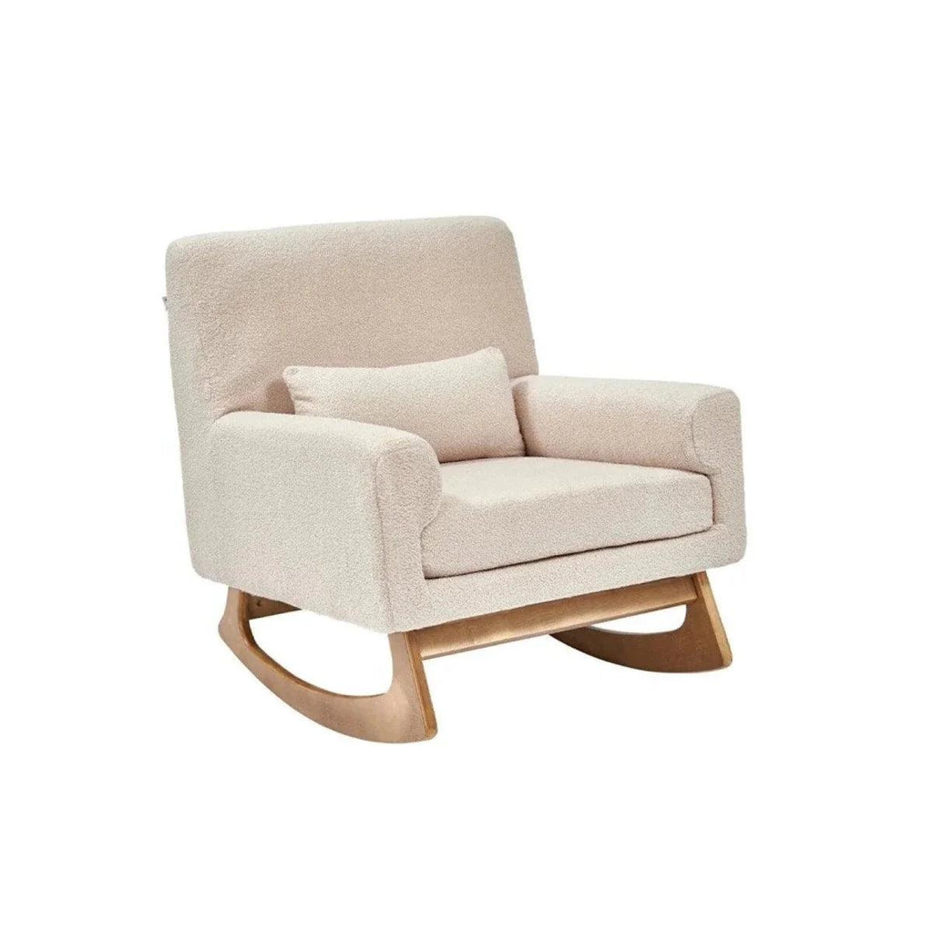 Nursing chair in biscuit boucle with padded arms and curved wooden rocking base