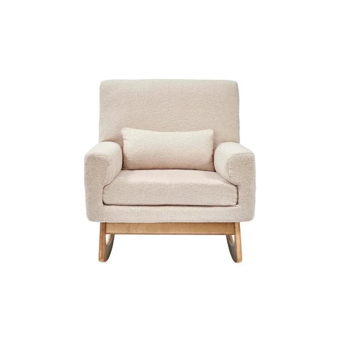Nursing chair in biscuit boucle with square seat cushion and short wooden legs