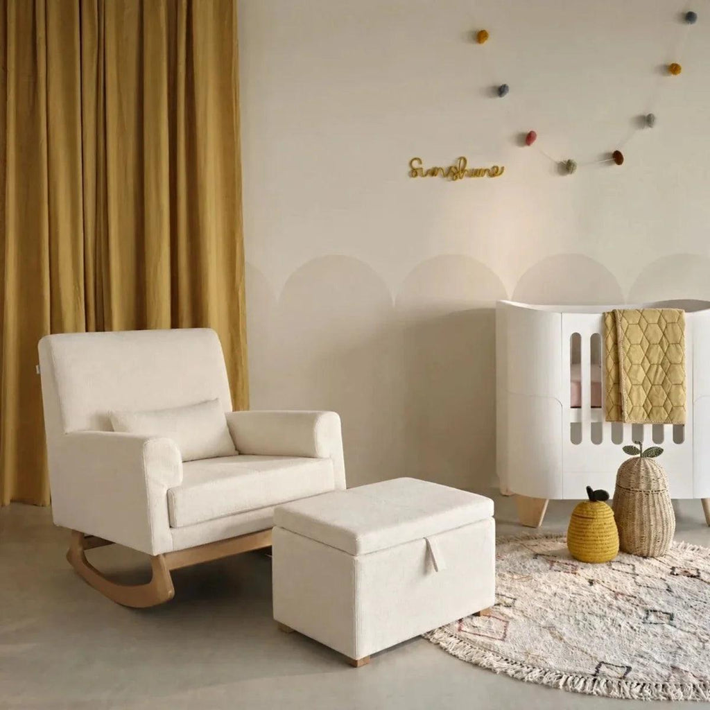 Nursing chair and footstool set in chalk boucle with curved wooden base