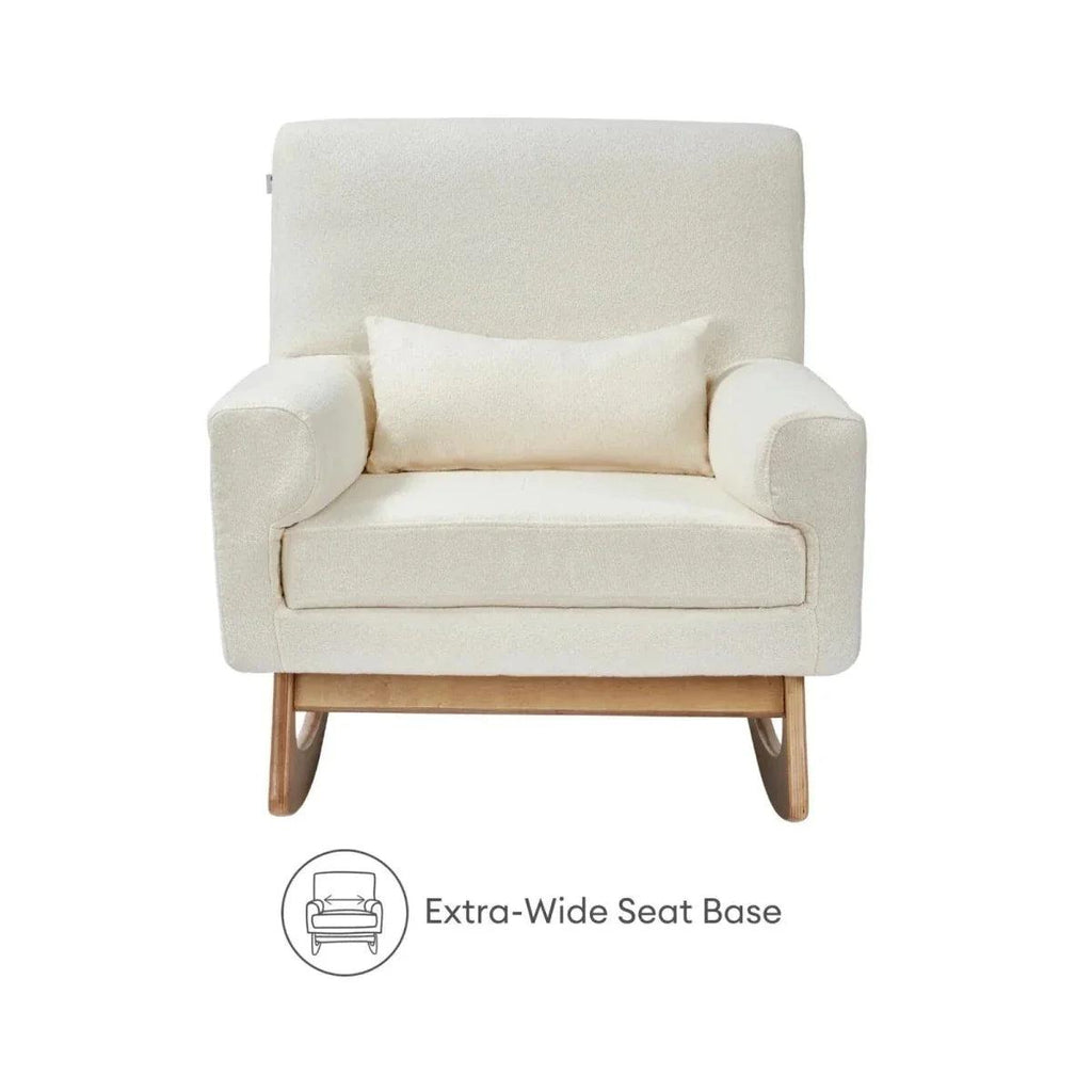 Boucle nursing chair with extra-wide seat base and wood legs