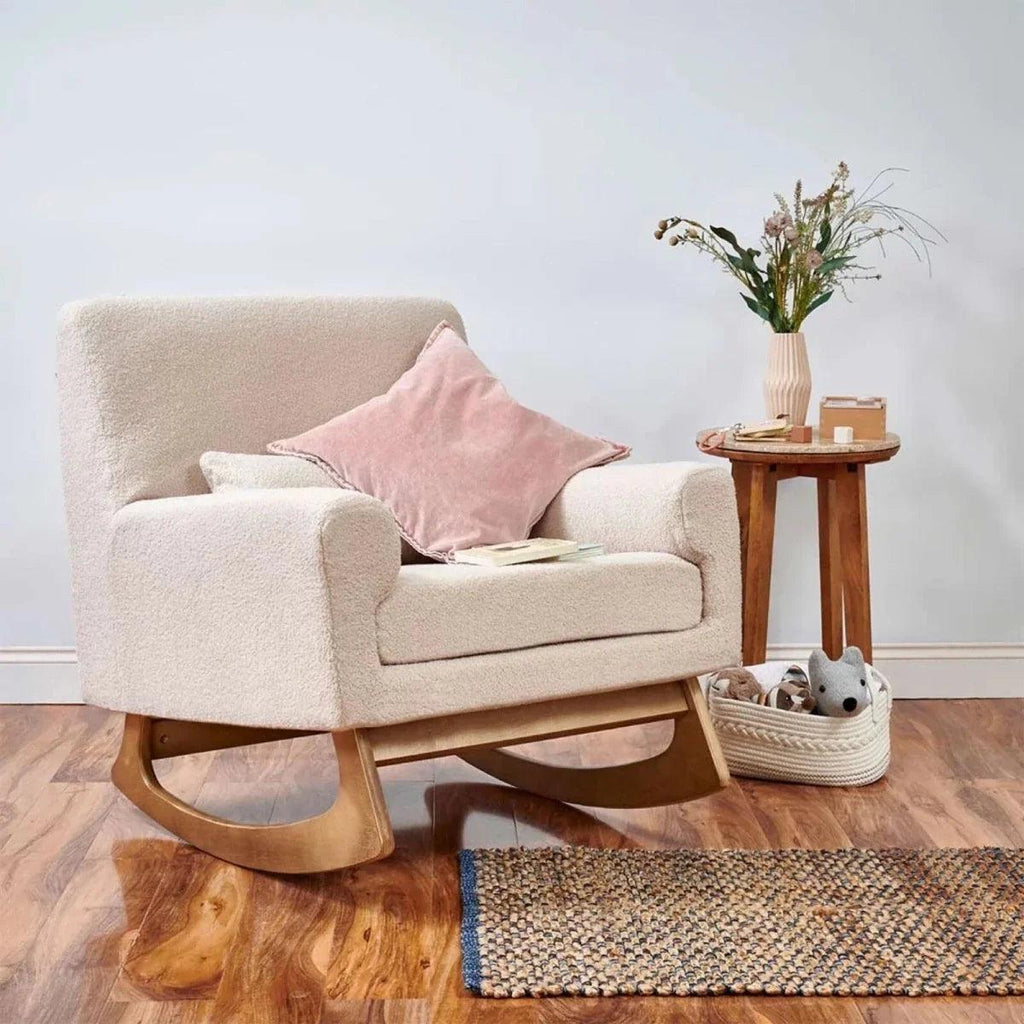 Beige boucle baby rocking & nursing chair with curved wooden rockers and armrests