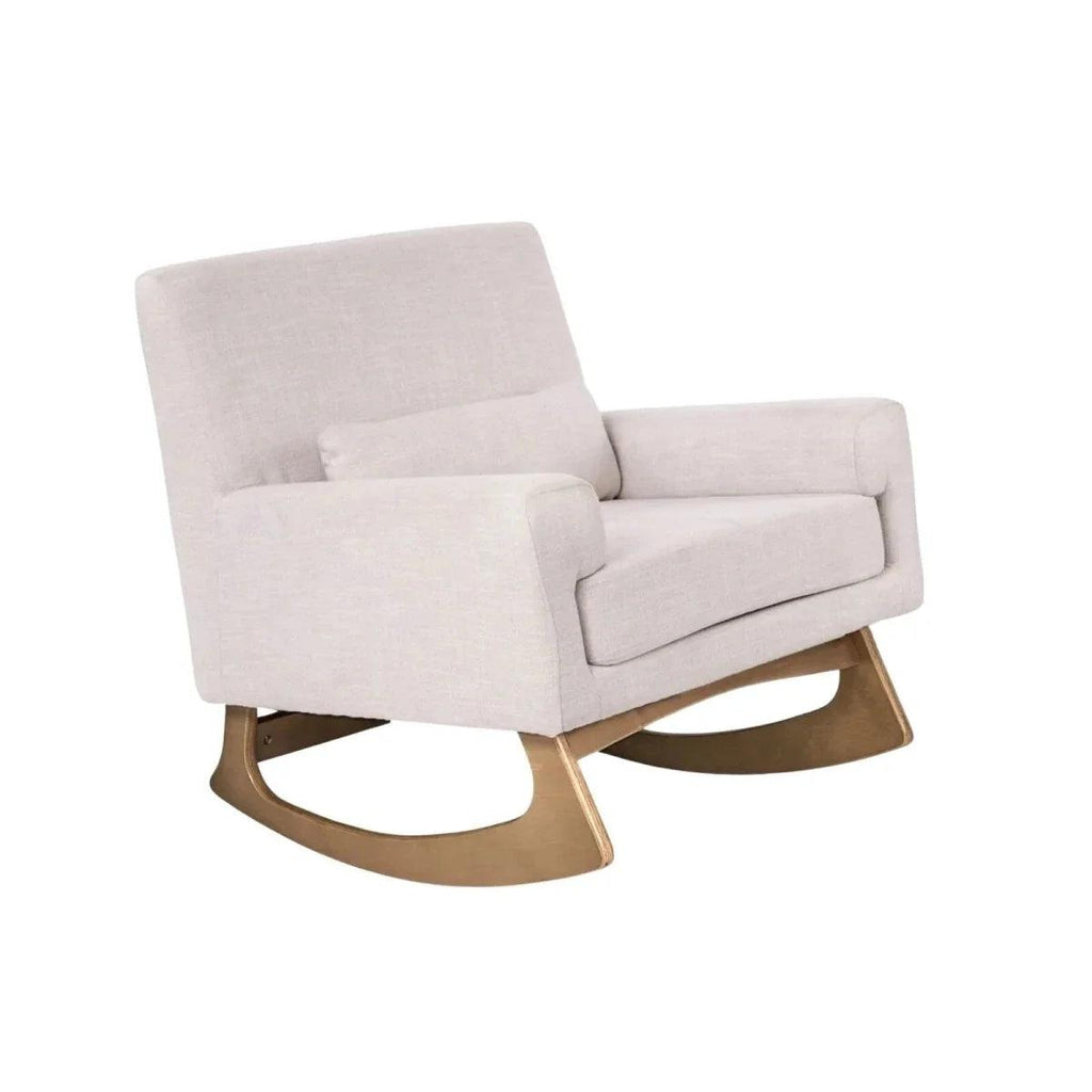 Oat upholstered rocking and nursing chair with wide arms and curved wood base