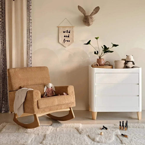 Caramel corduroy rocking nursing chair with cushioned seat and curved wooden rockers