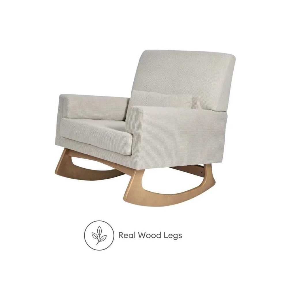 Ecru rocking nursing chair with thick back cushion, padded arms, and curved wooden rocker base