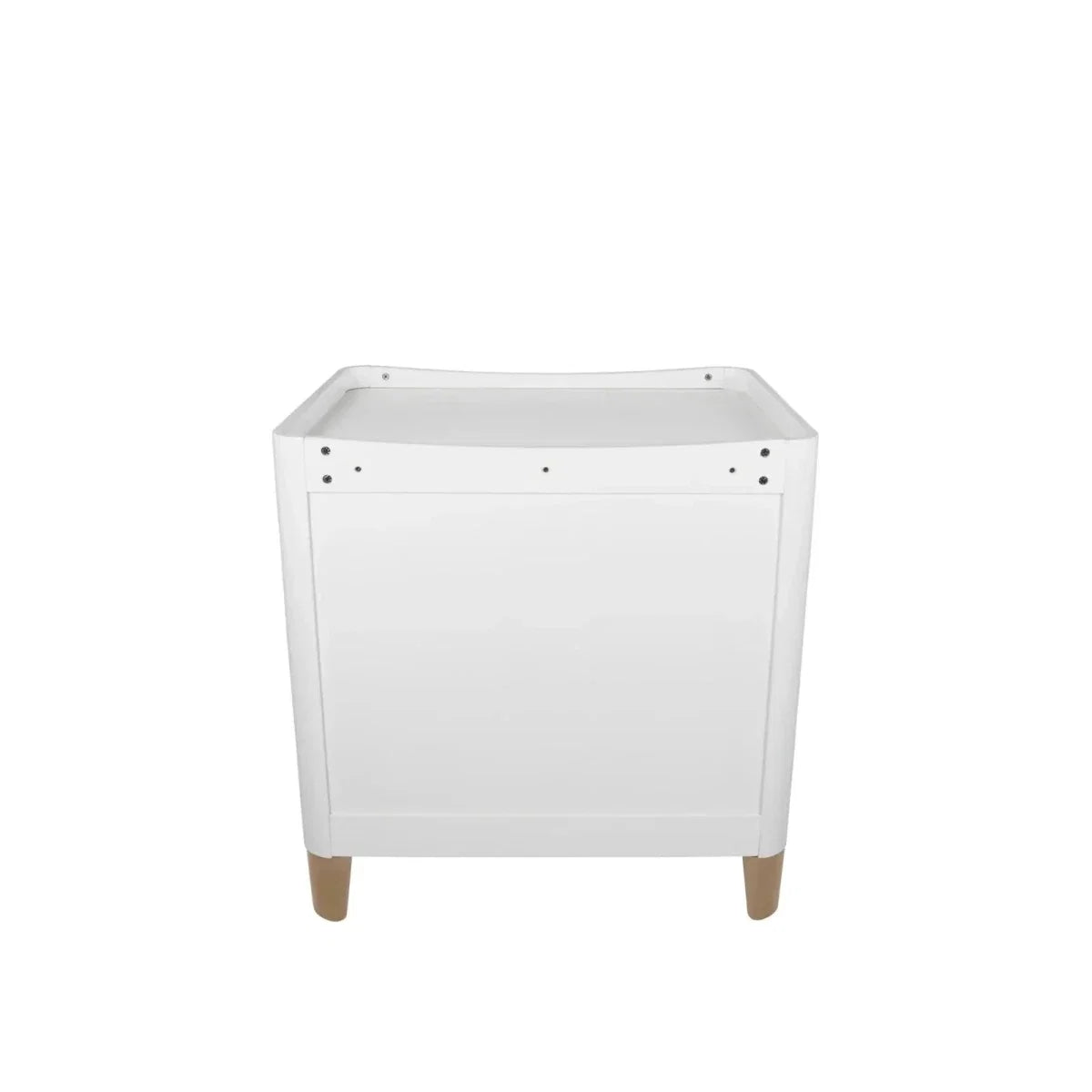 White baby dresser with changing tray and natural wood legs, front view