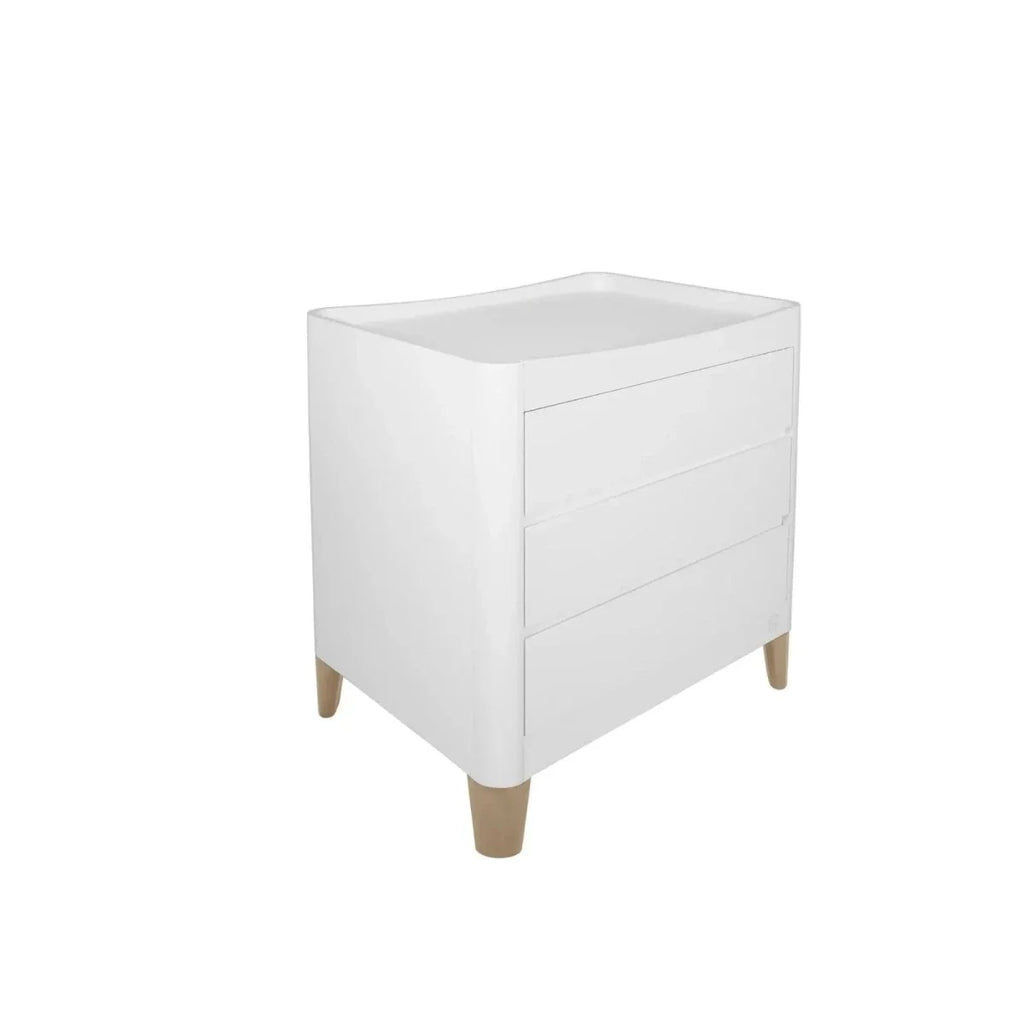 White baby dresser with two drawers and changing top, natural wood feet