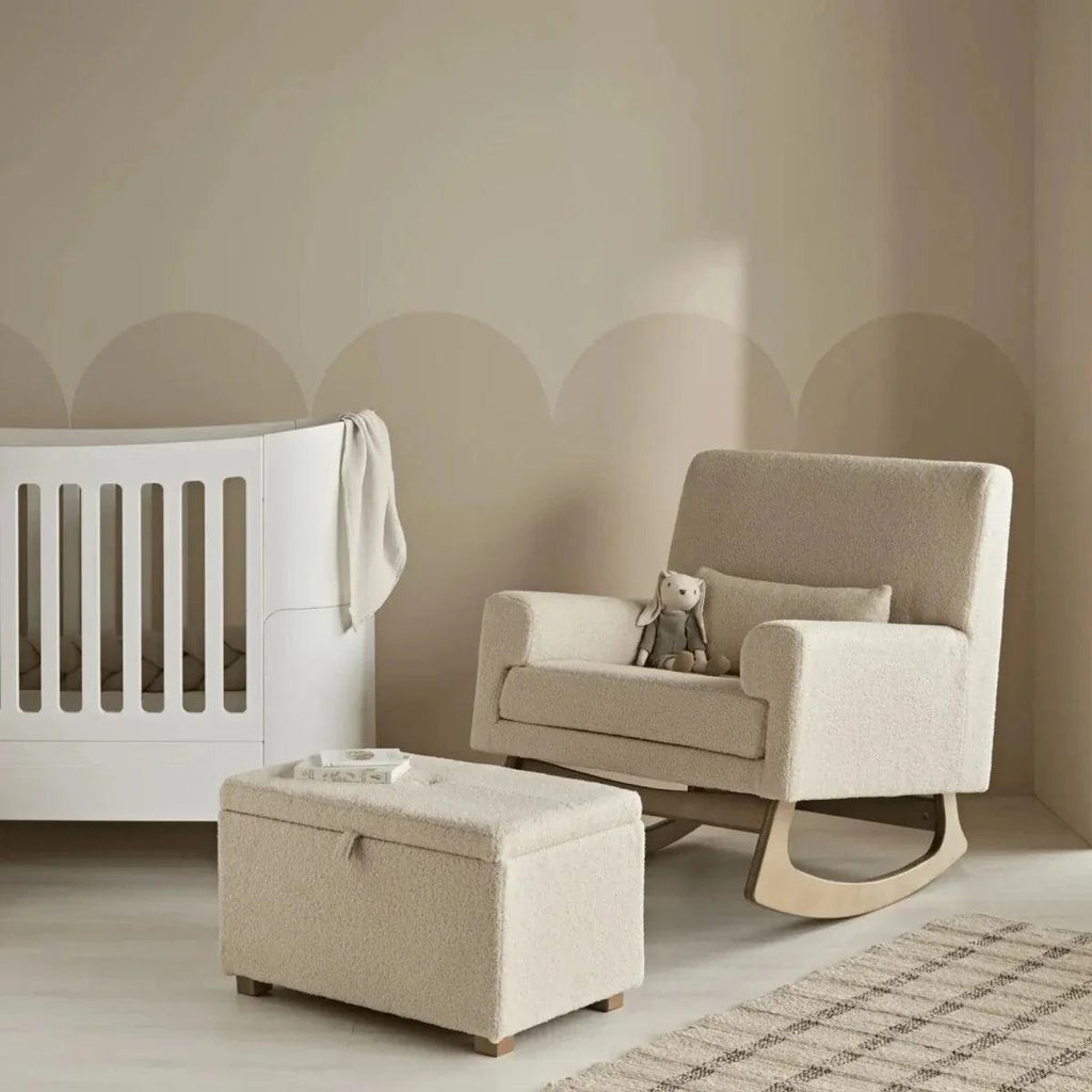 Light beige boucle square footstool with hinged lid and low wooden legs