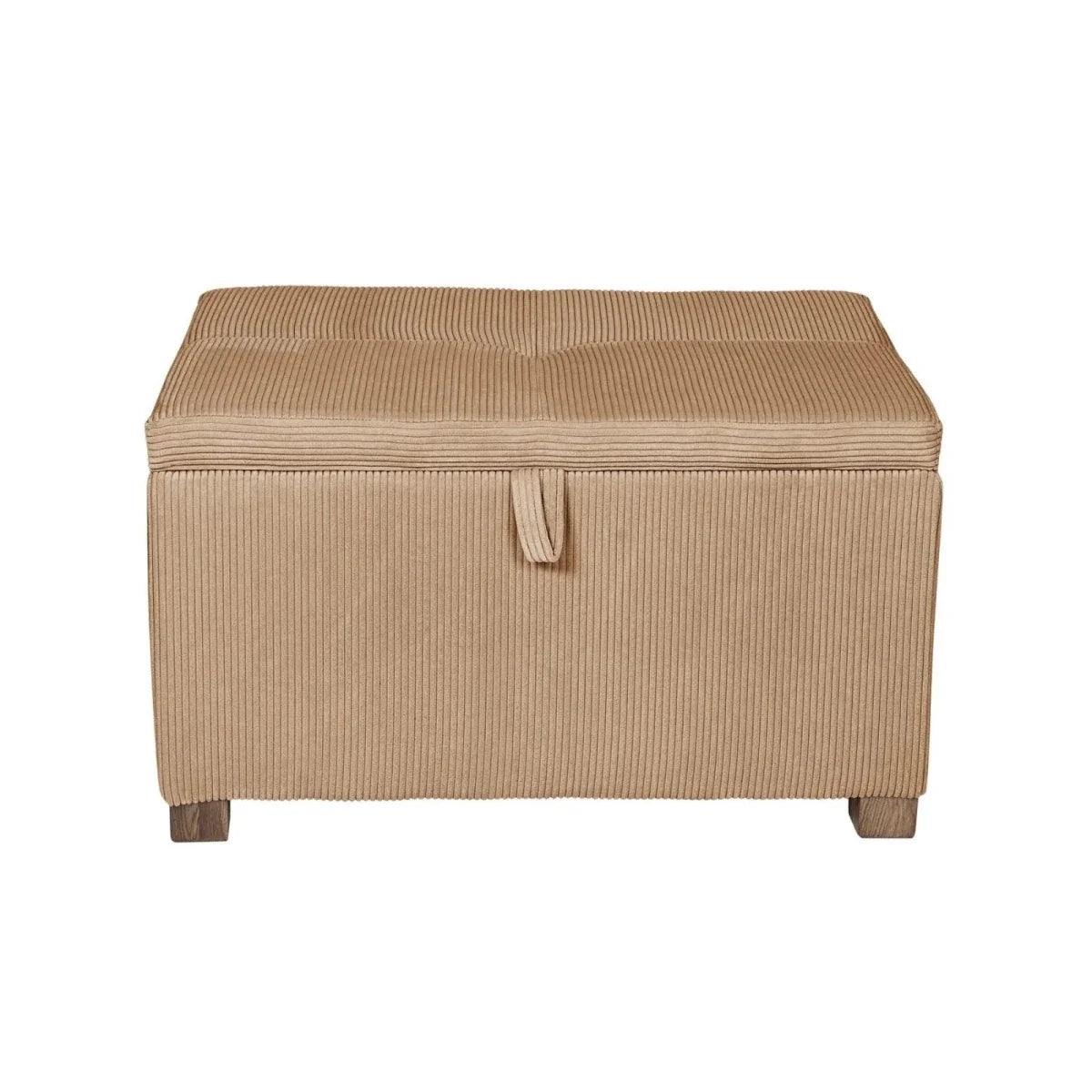 Caramel corduroy footstool with square padded seat, front pull handle, and tapered wooden legs.