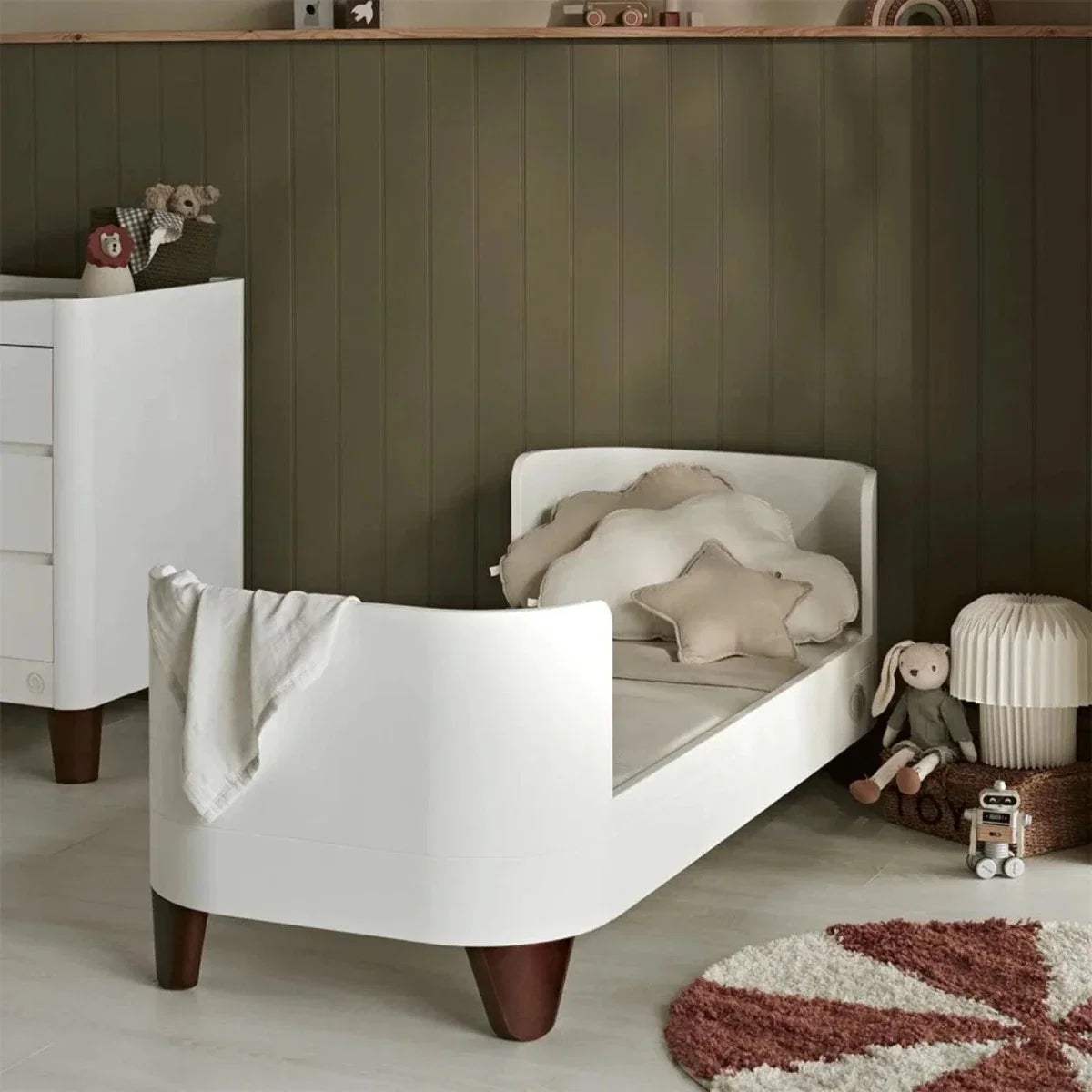 White junior bed extension with side panels and curved end posts