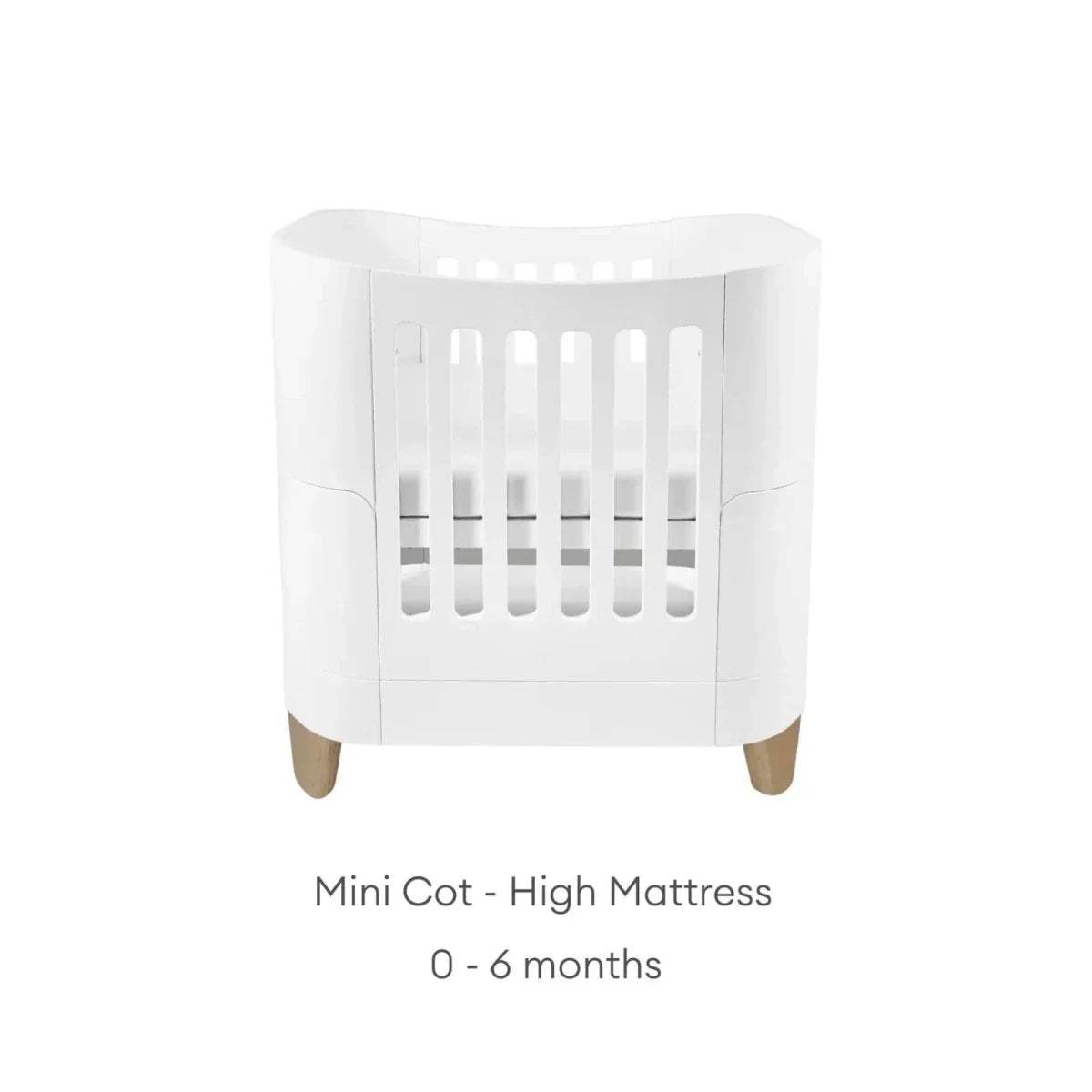 White mini cot with high mattress position, front view