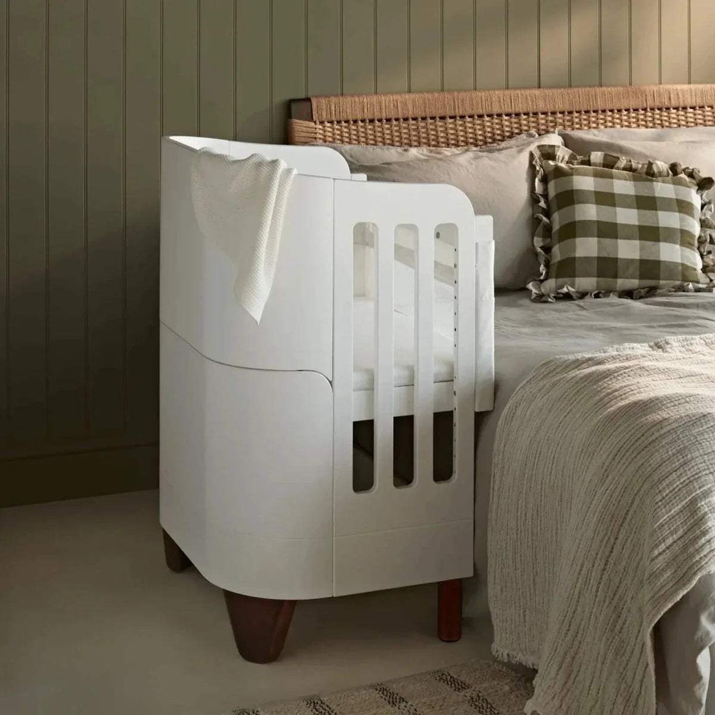 Gaia Baby bedside crib fitted sheet, white, fitted on crib mattress