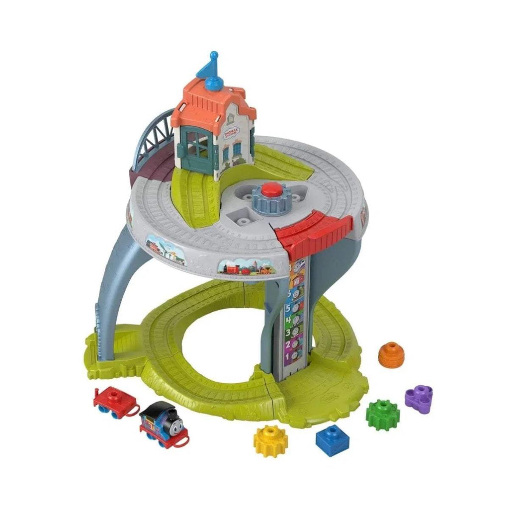 Kids 3D train table with rotating track, play pieces, and colorful tower unit