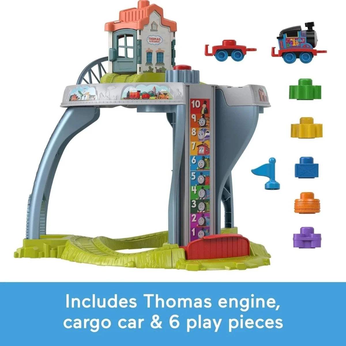 Kids train table with accessory pieces including toy locomotive and colorful blocks