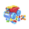 Red and blue block scooping wagon with yellow top and colorful plastic blocks