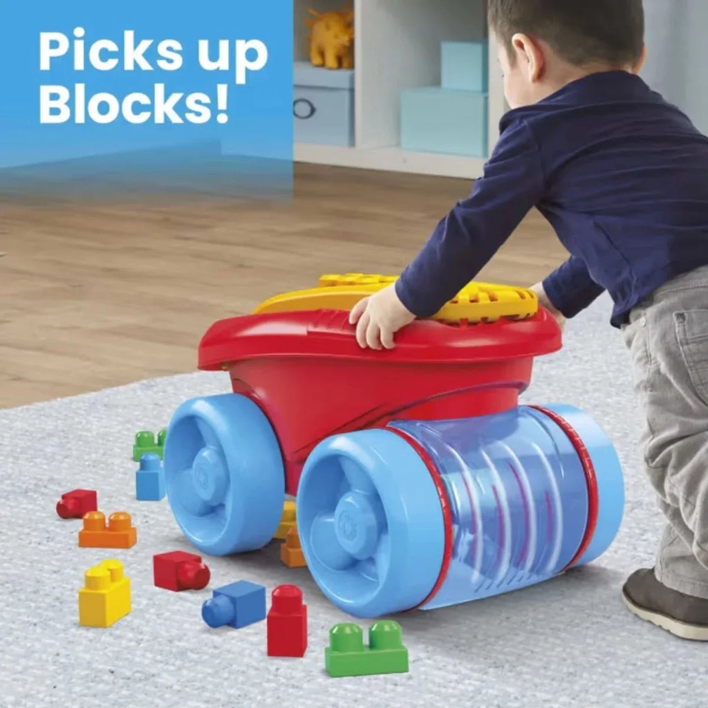Block scooping wagon with blue wheels and red scoop, lifting colorful building blocks
