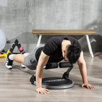 Black ab crunch trainer in use, supporting a seated person on the round padded base.