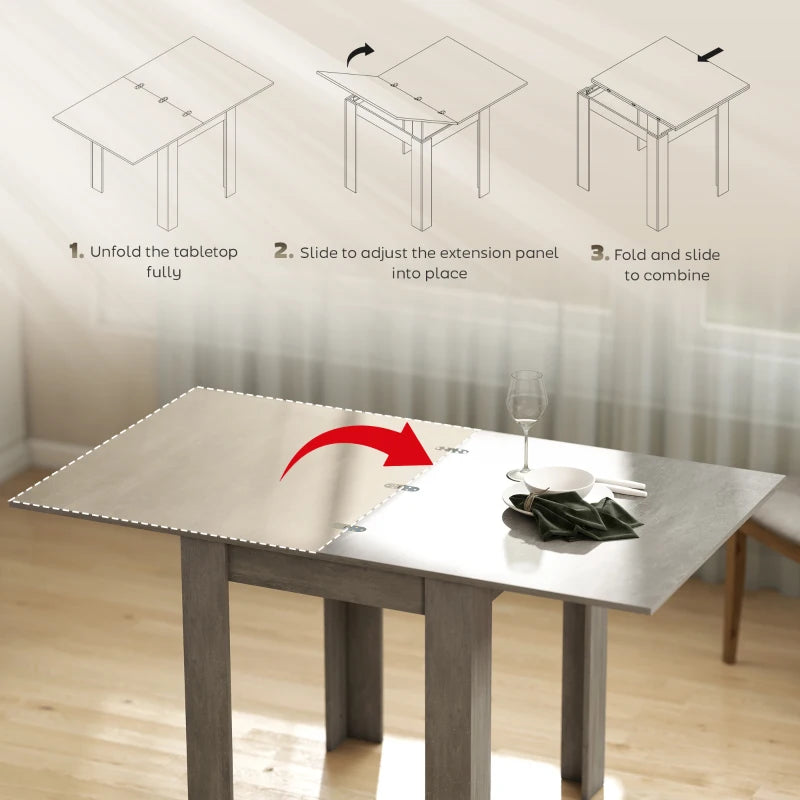 Grey rectangular table with extension panel lifted for expanding the tabletop.