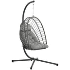 Hanging egg swing chair with dark rattan-style frame and light grey padded cushion