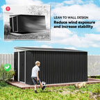 Black corrugated metal shed with vertical ribbed panels and lean-to style roof