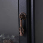 Black electric fireplace side handle detail with textured metal finish