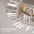 Close-up of crystal ceiling light with clear prisms and shiny metal trim