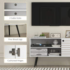 White TV storage unit close-up showing cable holes, fine wood legs, hinges.