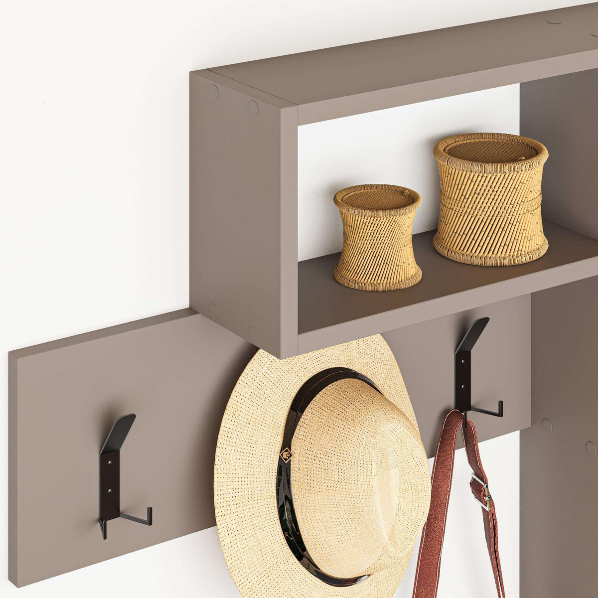 Close-up of game hanger with hat on shelf, hanging bag, and three black coat hooks beneath.