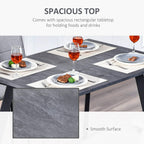 Charcoal grey rectangular dining table with smooth tabletop surface and metal legs