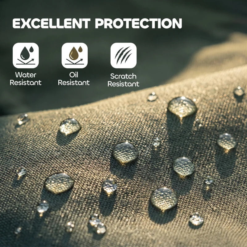 Green waterproof fabric close-up with water droplets on the quilted surface