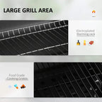Black grill cooking grates with warming rack above