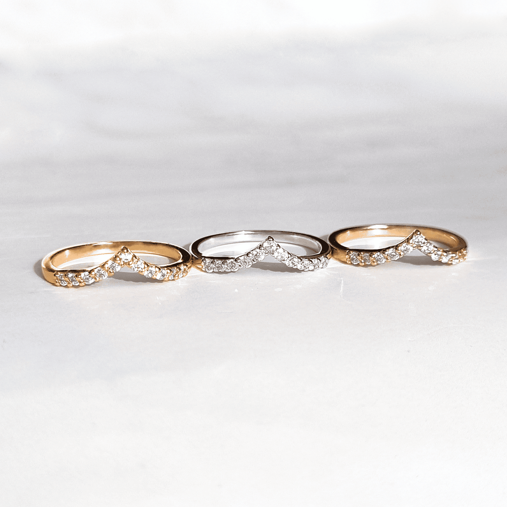 Wishbone curved eternity rings in gold, silver, and rose gold