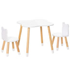 Kids table set with white bear-shaped chairs, white tabletop, and light wood legs