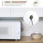 White freestanding kitchen cabinet countertop with cable management hole near the drawer