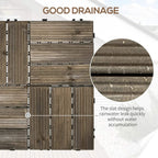 Charcoal grey wooden interlocking decking tile showing slat gaps for drainage