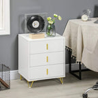 White three-drawer chest with gold handles and angled legs; bottom drawer open