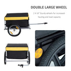 Two-wheel cargo trailer with double large wheels, yellow-and-black cover, gray metal frame