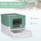 Green hooded cat litter box showing scoop and removable tray for cleaning