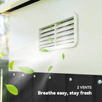 Black corrugated metal shed with two vents for improved airflow