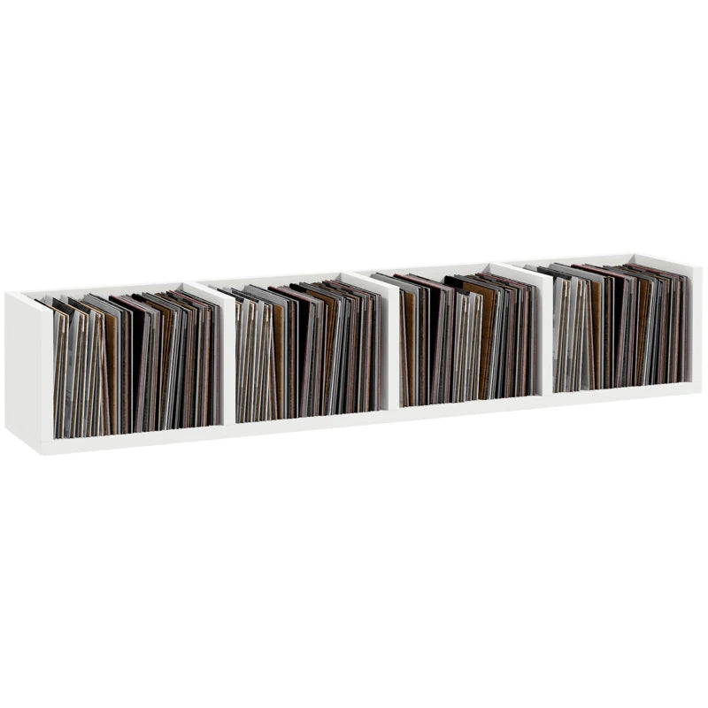 White wall-mount media storage shelf with four open cubby compartments for discs