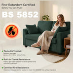 Dark green corduroy 2-seat sofa with two throw pillows in a living room setting